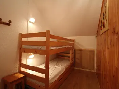 Un ou plusieurs lits dans un hébergement de l'établissement Appartement Duplex pour 5 à Val Cenis le Haut - À 200m des Pistes - FR-1-508-215