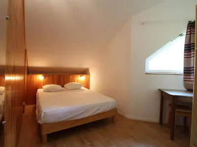 Un ou plusieurs lits dans un hébergement de l'établissement Appartement Duplex pour 5 à Val Cenis le Haut - À 200m des Pistes - FR-1-508-215