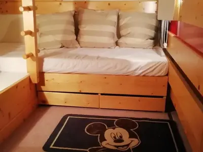 Un ou plusieurs lits dans un hébergement de l'établissement Duplex skis aux pieds pour 5 pers. à Arc 1800, Charmettoger, avec balcon et WIFI - FR-1-411-41