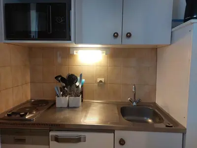 Cuisine ou kitchenette dans l'établissement Studio cabine 4 pers, terrasses, proche pistes - FR-1-411-137