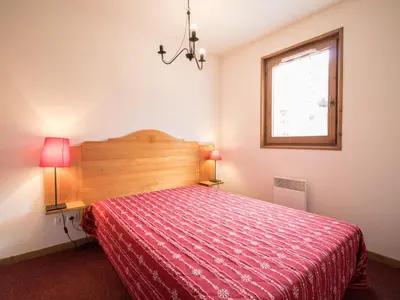 Un ou plusieurs lits dans un hébergement de l'établissement Appartement spacieux 6 pers, balcon sud, parking - FR-1-508-8
