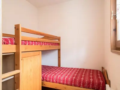 Un ou plusieurs lits dans un hébergement de l'établissement Appartement spacieux 6 pers, balcon sud, parking - FR-1-508-8