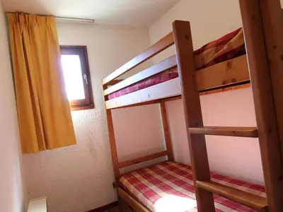Un ou plusieurs lits dans un hébergement de l'établissement Appartement cosy 7 pers à 300m des pistes à Lanslebourg - FR-1-508-10