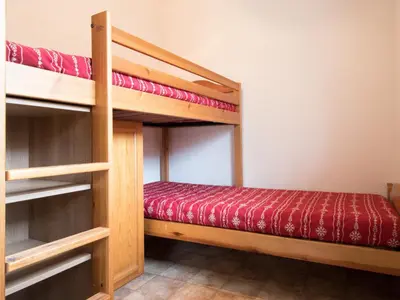 Un ou plusieurs lits dans un hébergement de l'établissement Appartement spacieux 6 pers au pied des pistes avec wifi et parking - FR-1-508-13