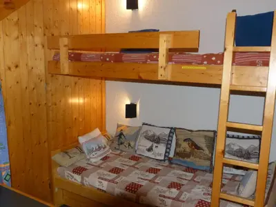Un ou plusieurs lits dans un hébergement de l'établissement Appartement 2 pièces 6 personnes, balcon et Wifi aux Arcs 1800 - FR-1-411-107