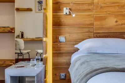 Un ou plusieurs lits dans un hébergement de l'établissement Chalet Hotel Du Fornet