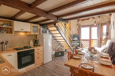 Cuisine ou kitchenette dans l'établissement Résidence Les hauts de Val Cenis