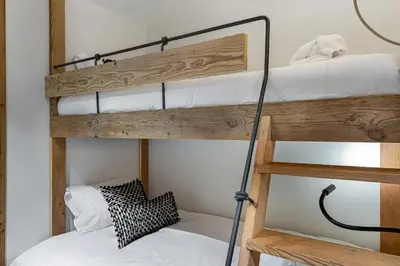 Un ou plusieurs lits dans un hébergement de l'établissement Appartement Sifflote - LES CHALETS COVAREL