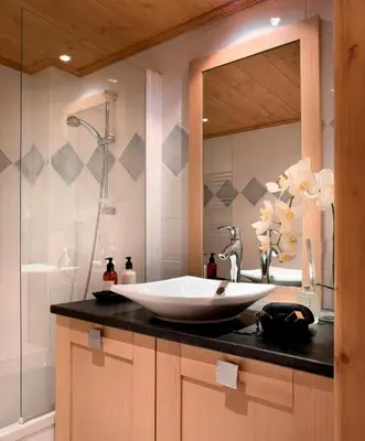 Salle de bains dans l'établissement CGH Résidence Boutique Le Lodge des Neiges