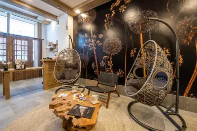 Coin salon dans l'établissement CGH Résidence Boutique Le Lodge des Neiges