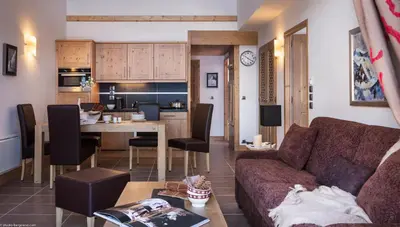 Cuisine ou kitchenette dans l'établissement CGH Résidence Boutique Le Lodge des Neiges