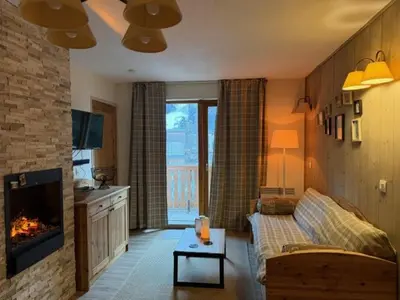 Télévision ou salle de divertissement dans l'établissement Appartement cosy proche commerces, animaux bienvenus, parking - FR-1-464-160