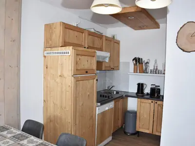 Cuisine ou kitchenette dans l'établissement Appartement cosy proche commerces, animaux bienvenus, parking - FR-1-464-160