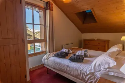 Un ou plusieurs lits dans un hébergement de l'établissement Bel Appartement spacieux 65m2 Les Arcs 1950