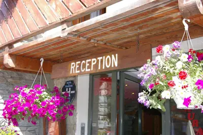 Hall ou réception de l'établissement Hôtel du Glacier des Evettes
