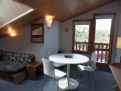 Coin salon dans l'établissement Studio spacieux au cœur de Belle Plagne, animaux admis - FR-1-181-1531