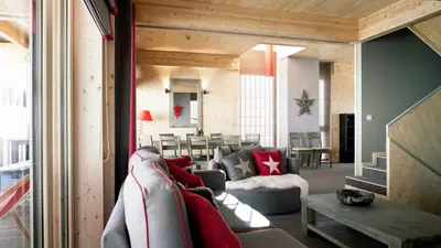 Coin salon dans l'établissement L'Aiguille Grive Chalets Hotel