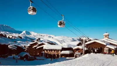 L'établissement Studio cosy à Mâcot-la-Plagne 24 m² avec vue montagne en hiver