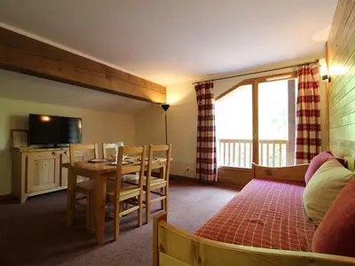 Télévision ou salle de divertissement dans l'établissement Appartement pour 4 personnes avec piscine, pied des pistes à Val Cenis - FR-1-508-132
