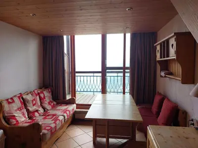 Coin salon dans l'établissement Charmant duplex pour 4 pers. avec vue magnifique à Arc 1800 - FR-1-411-479