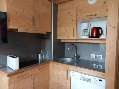 Cuisine ou kitchenette dans l'établissement Duplex 2 pièces pour 5 pers. aux Arcs 1800, balcon et Wifi - FR-1-411-47