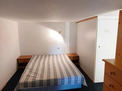 Un ou plusieurs lits dans un hébergement de l'établissement Duplex 2 pièces pour 5 pers. aux Arcs 1800, balcon et Wifi - FR-1-411-47