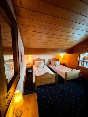 Un ou plusieurs lits dans un hébergement de l'établissement Chalet Rocher - Luxury Ski Chalet, Sainte Foy