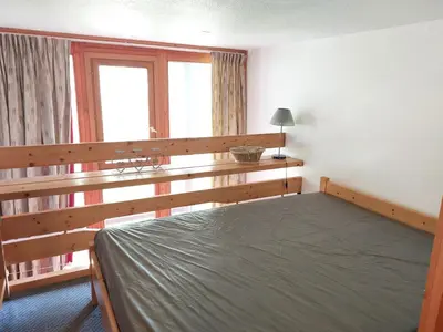 Un ou plusieurs lits dans un hébergement de l'établissement Duplex cosy 4 pers. proche pistes aux Arcs 1800 - FR-1-411-278