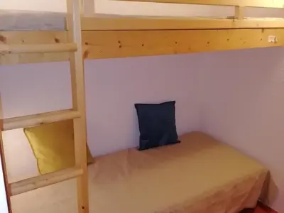 Un ou plusieurs lits dans un hébergement de l'établissement Studio 4 pers Arc 1800, animaux admis, proche pistes - FR-1-411-642
