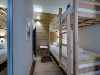 Un ou plusieurs lits dans un hébergement de l'établissement Appartement cosy au cœur de Tignes le Lac, terrasse et wifi - FR-1-641-82