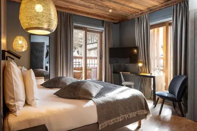 Un ou plusieurs lits dans un hébergement de l'établissement Hotel MONT-BLANC VAL D'ISERE