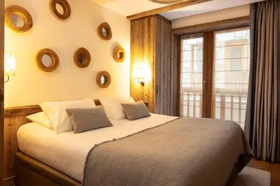 Un ou plusieurs lits dans un hébergement de l'établissement Hotel MONT-BLANC VAL D'ISERE
