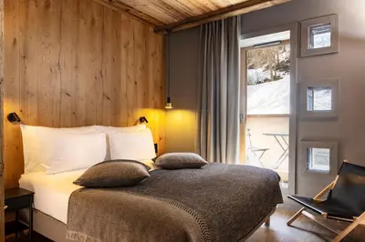 Un ou plusieurs lits dans un hébergement de l'établissement Hotel MONT-BLANC VAL D'ISERE