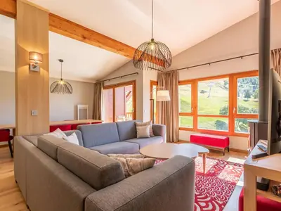 Coin salon dans l'établissement Duplex 4 chambres avec piscine, spa et parking aux Arcs 1800 - FR-1-352-55