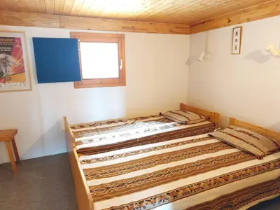 Un ou plusieurs lits dans un hébergement de l'établissement Duplex 2 pièces, 5 pers, à Arc 1800, animaux admis - FR-1-411-52
