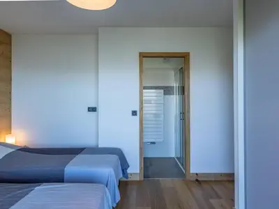 Un ou plusieurs lits dans un hébergement de l'établissement Les Arcs 1800 : Appart lumineux 3P, sauna, hammam, proche pistes, 6 pers - FR-1-352-60