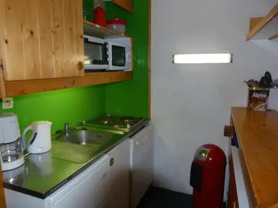 Cuisine ou kitchenette dans l'établissement Duplex skis aux pieds 3 pièces, 8 pers, Animaux admis - FR-1-411-59