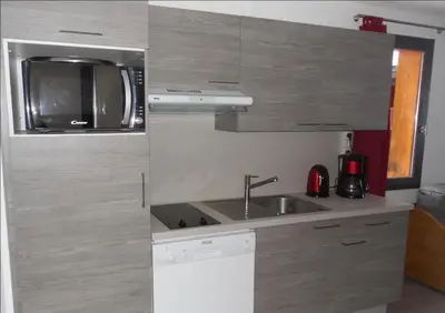 Cuisine ou kitchenette dans l'établissement Belle Plagne 1 Appart 6 pers du Dimanche au Dimanche Ski au pieds