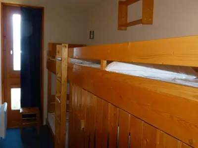 Un ou plusieurs lits dans un hébergement de l'établissement 2 pièces 5 pers, balcon sud-ouest, résidence Arc 1800 - FR-1-411-104