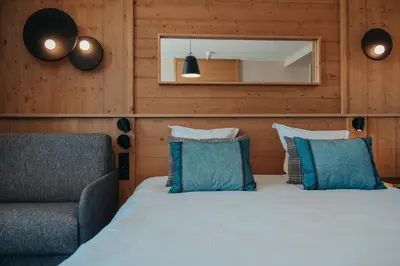 Un ou plusieurs lits dans un hébergement de l'établissement Hôtel L'Eden des Cimes - Vacances Bleues - Belle Plagne 2100