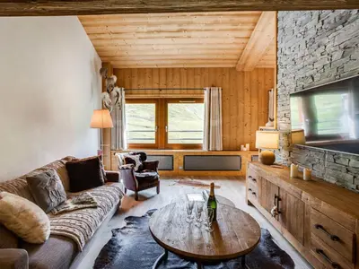 Coin salon dans l'établissement Apartment Grand Roc - Val Claret-2 by Interhome