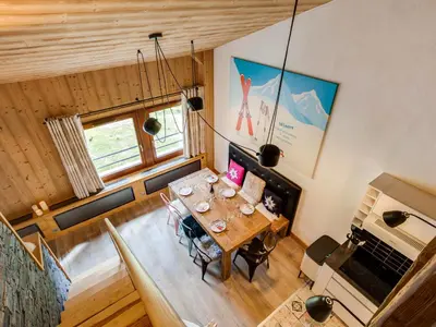 Coin salon dans l'établissement Apartment Grand Roc - Val Claret-2 by Interhome