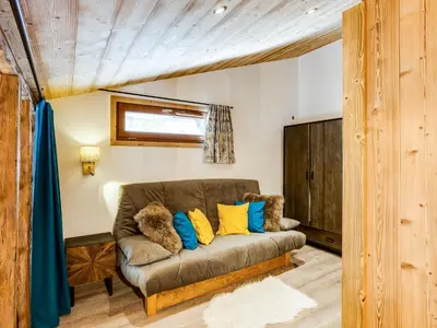 Coin salon dans l'établissement Apartment Grand Roc - Val Claret-2 by Interhome