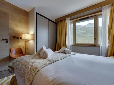 Un ou plusieurs lits dans un hébergement de l'établissement Appartement spacieux 5 pièces avec vue sur le Lac de Tignes - FR-1-641-83