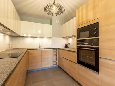 Cuisine ou kitchenette dans l'établissement Duplex moderne 3 Chambres - Balcon, Piscine, Spa, Ski aux pieds - FR-1-352-57