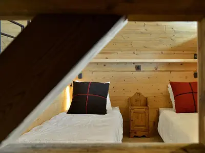 Un ou plusieurs lits dans un hébergement de l'établissement Chalet Savoyard 8-9 personnes à Vallandry avec Vue Montagne - FR-1-411-664