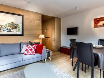 Télévision ou salle de divertissement dans l'établissement Charmant appartement 2 chambres, centre Val-d'Isère, proche pistes, WIFI inclus - FR-1-519-2