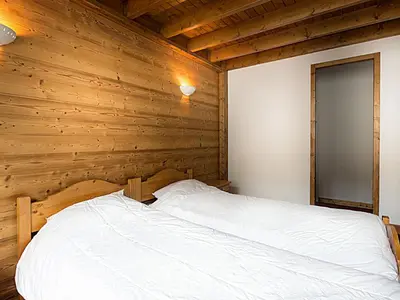 Un ou plusieurs lits dans un hébergement de l'établissement Superbe appartement au centre, proche pistes & commerces, 6 pers, WIFI - FR-1-519-21