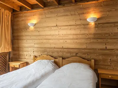 Un ou plusieurs lits dans un hébergement de l'établissement Superbe appartement au centre, proche pistes & commerces, 6 pers, WIFI - FR-1-519-21