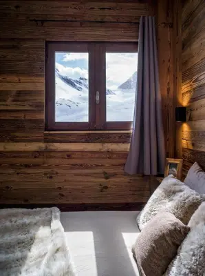 Un ou plusieurs lits dans un hébergement de l'établissement Magnifique Duplex Oneigedor Départ ski aux pieds et vue montagne